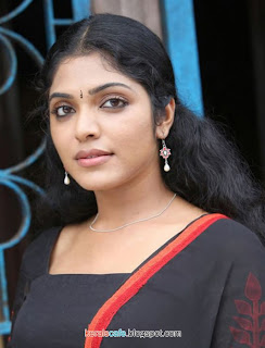 Rima Kallingal hot photos,Actress Rima Kallingal hot photoshoots stills,Download Latest rima Kllingal hot Photos & pictures,Checkout thee new collecion of Rima Kallingal photos, Rima Kallingal Latest Hot Stills