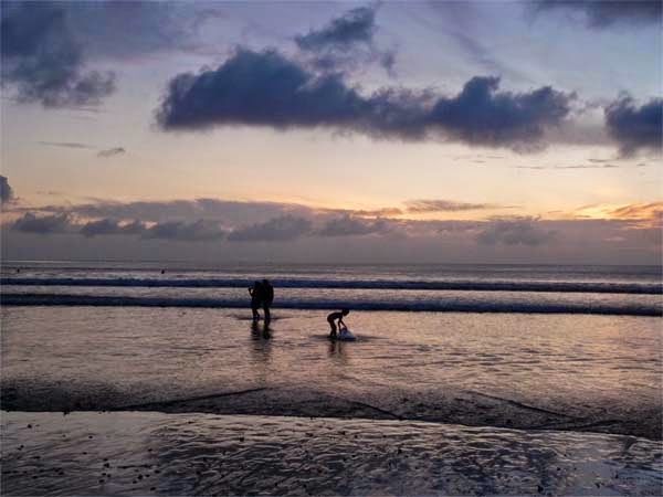 Beaches in Bali: Beautiful Sunset at Kuta Beach the beach is e'er crowded past times unusual together with domestic tourists Beaches in Bali: Beautiful Sunset at Kuta Beach
