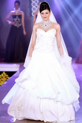Sushmita Sen in a white gown with white diamond necklace Sushmita Sen in a white gown with white diamond necklace