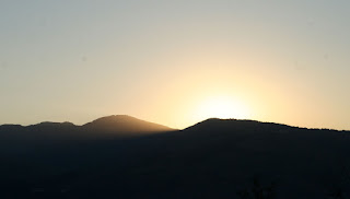 Just before the sun arrives, shining through the notch Just before the sun arrives, shining through the notch