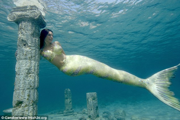 Kelly Brook Poses under Water in Mermaid Costume