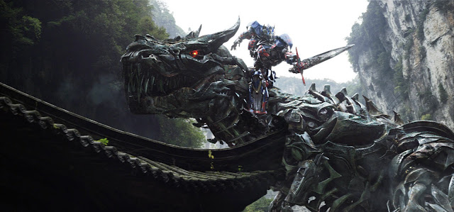 Transformers 4 Age of Extinction movie still - Optimus Prime on Grimlock Dinobot