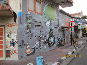 "CLIMATE ART-2013":- A wall grafitti on a street in Yogyakarta.