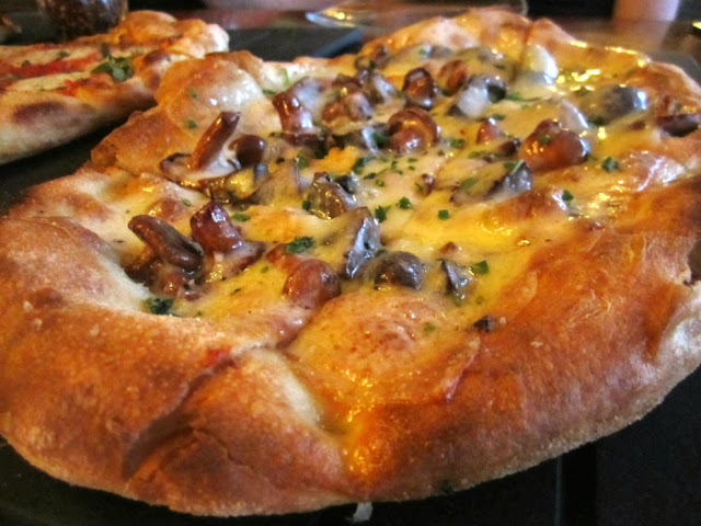 chanterelle mushroom pizza with truffle cheese chanterelle mushroom pizza with truffle cheese