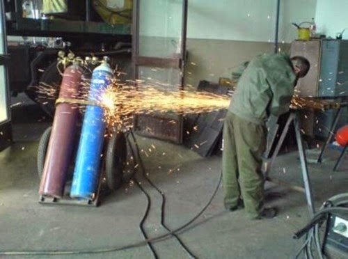 health and safety at work fail angle grinder safety funny fail sparks shooting at compressed gas cylinders