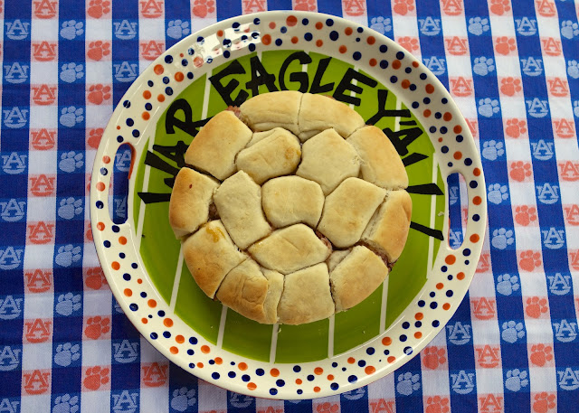 Brown Sugar Ham Rolls - Sister Schubert rolls split and brushed with a brown sugar glaze and topped with swiss and deli ham - great for parties! Can make ahead of time and freeze for later. These things fly off the plate!!