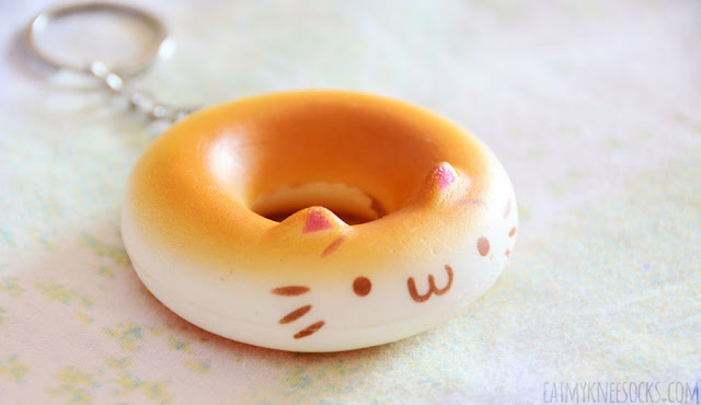 Skoshbox September 2015 DEKAbox Review: Cat Donut Keychain The September 2015 Skoshbox DEKAbox included a squishy cat donut keychain as the mystery accessory, with five different colors.