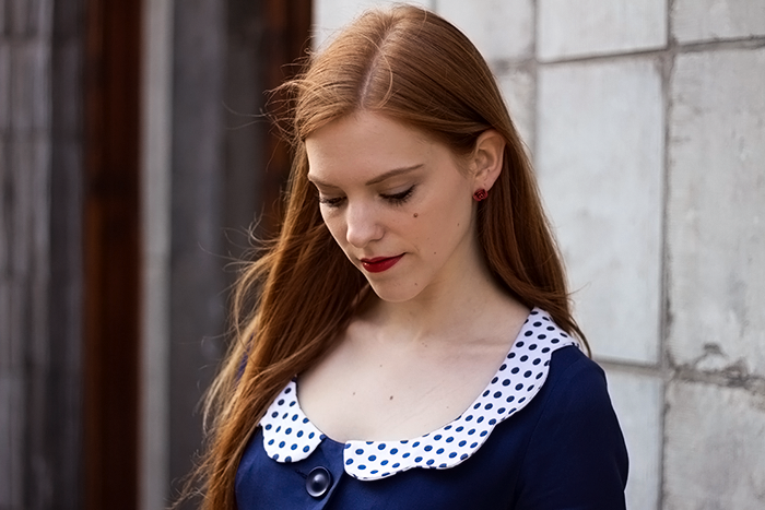 Retro fashion blogger outfit with a vintage Mary Poppins coat worn as a dress
