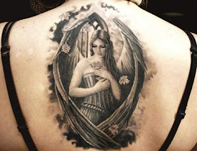 tatuagens de anjos nas costas femininas - foto