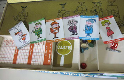 Contents of Clue box with character cards shown