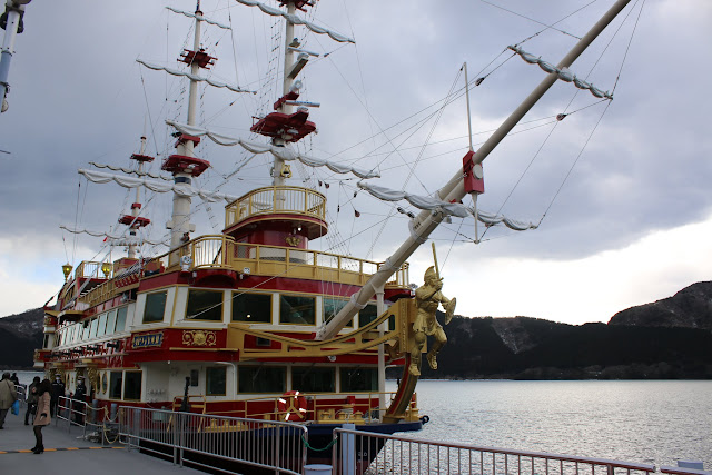 Heading onto the pirate ship shaped Hakone Sightseeing Cruise at Lake Ashinoko in Japan Heading onto the pirate ship shaped Hakone Sightseeing Cruise at Lake Ashinoko in Japan
