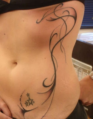 Simple Tattoo Design ideas on rib for girl Simple Tattoo Design ideas on rib for girl