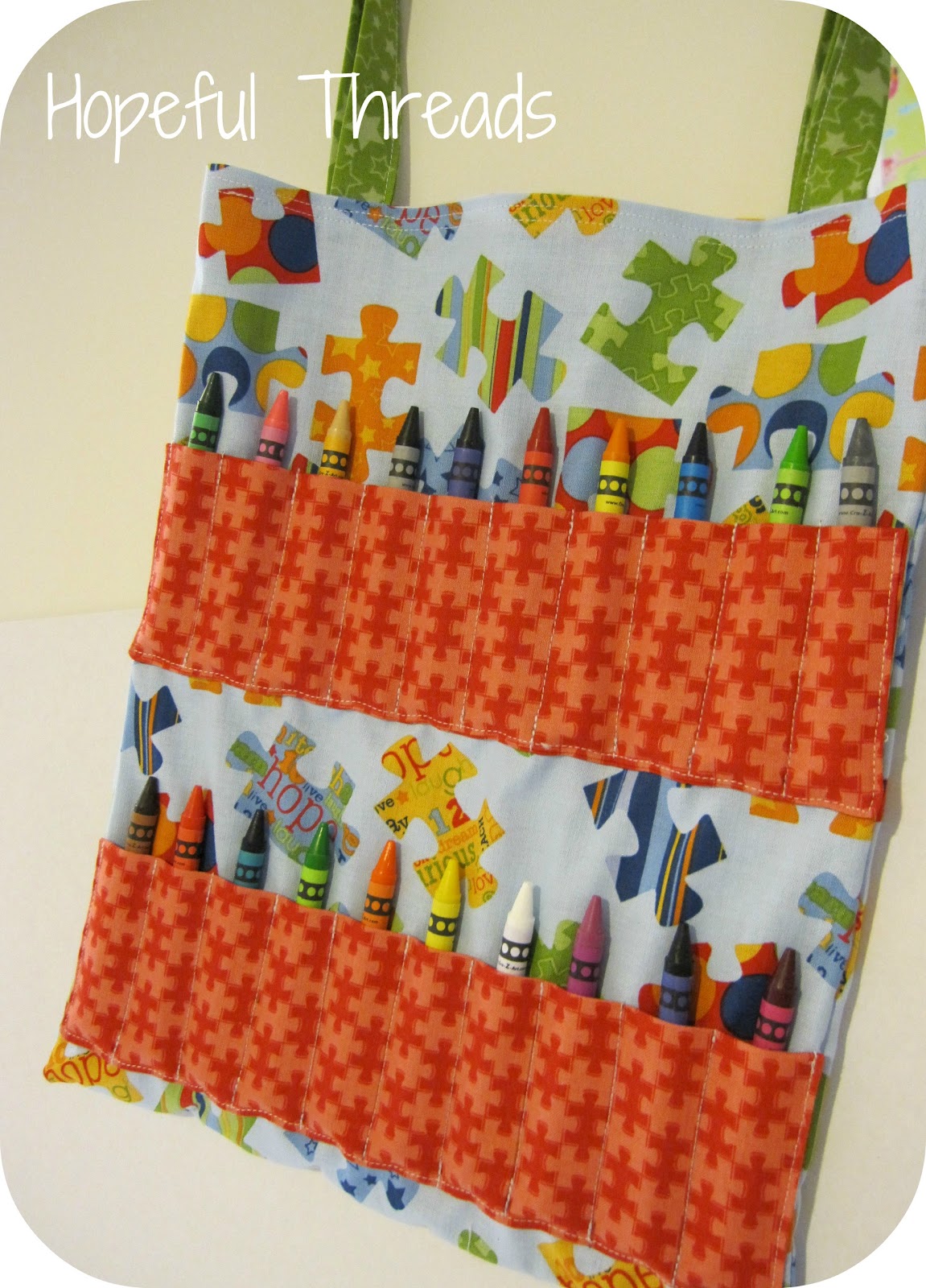 can find the FREE tutorial here, as the Coloring Book  Crayon Tote