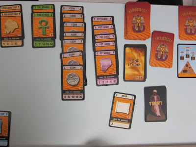 A close up of some of the cards in Archaeology