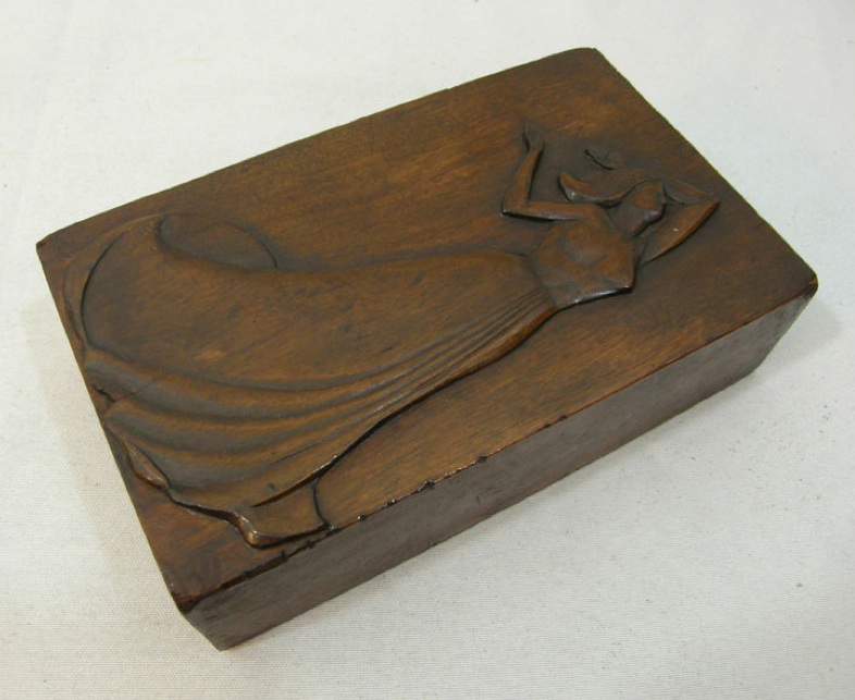 Circa 1920 39s American folk art relief carving depicting a stylish woman in a Circa 1920 39s American folk art relief carving depicting a stylish woman in a