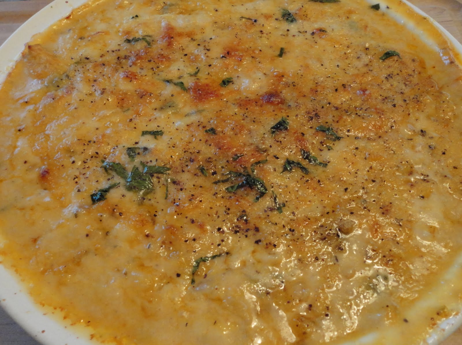 Cuisine with Chilean flavor Chupe de Ostiones y Camarones (Scallops