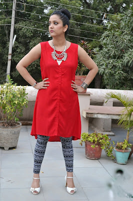 printed leggings and solid red tunic look