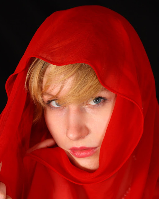 Pretty girl in a red scarf portrait - ready for B&W conversion (grayscale).