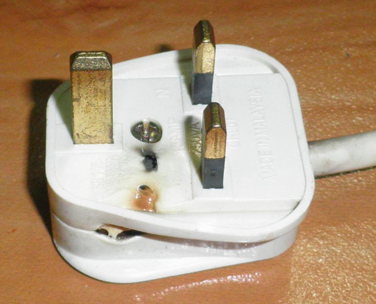 IT SCHEISS Shoddy Workmanship Results in Burnt Electrical Plug