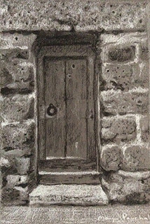 Charcoal and white pastel pencil of a rustic wooden door by Manju Panchal