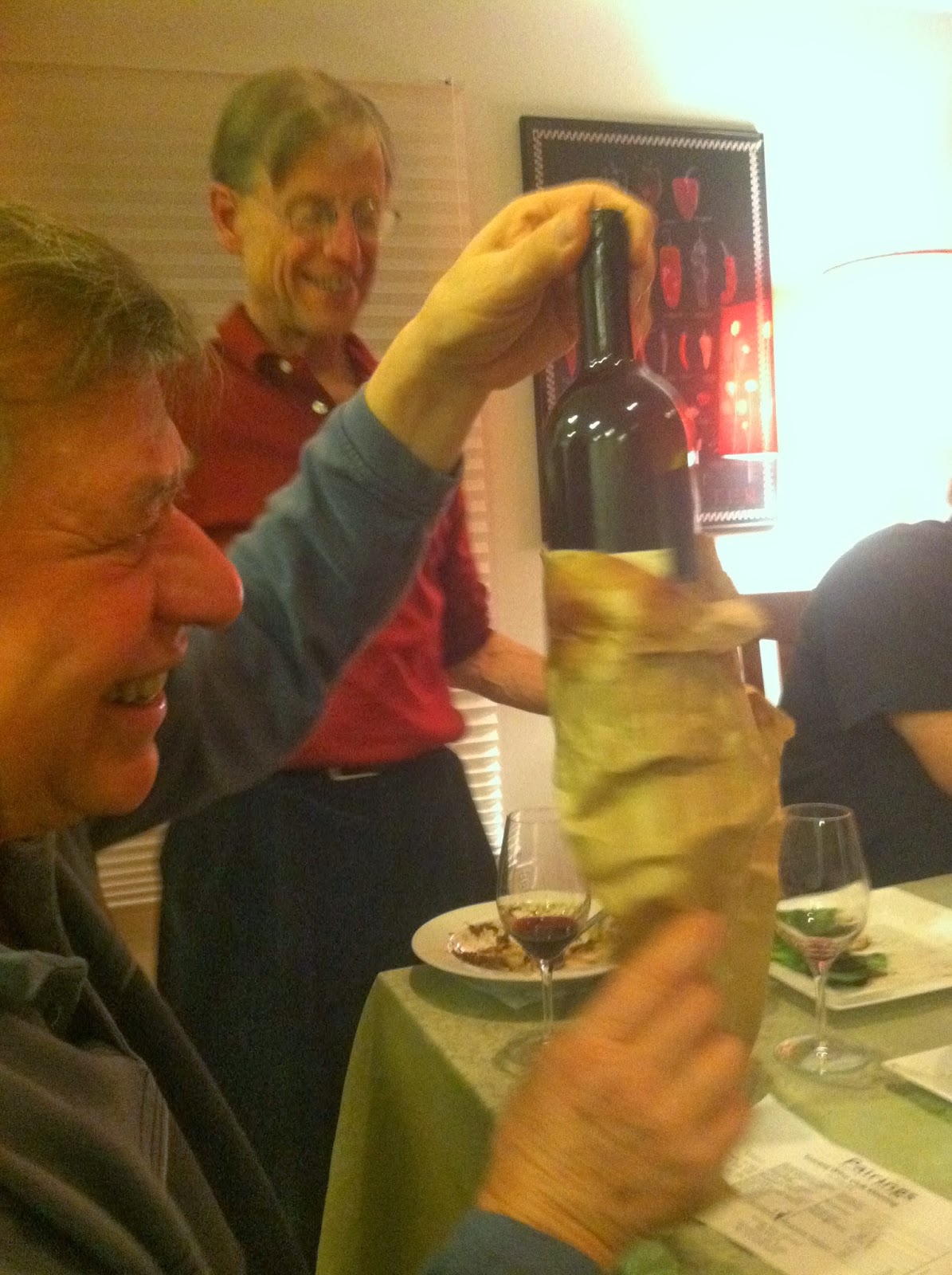 Wine Club fun Revealing a Super Tuscan from its paper bag at a wine club blind tasting. Cooking Chat post.