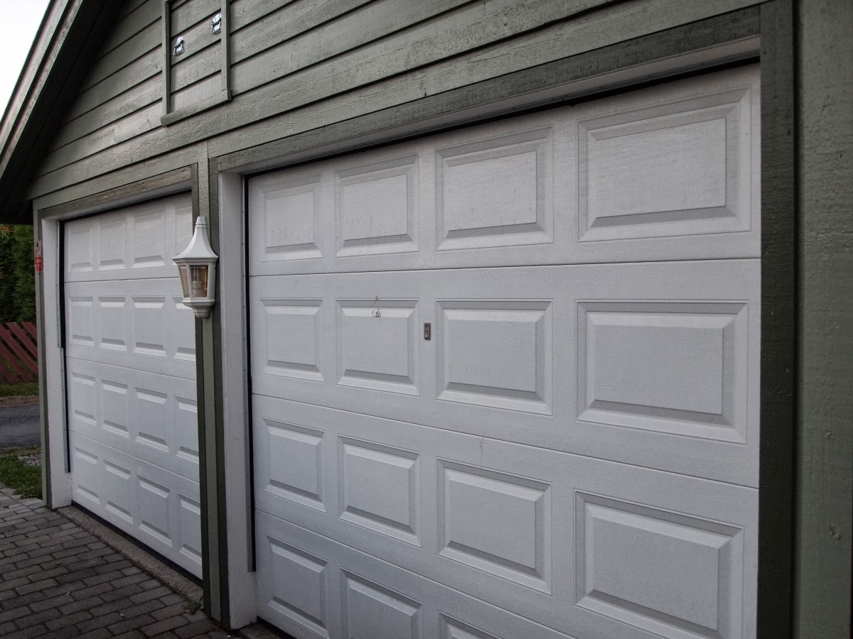 The Wandering Axeman Sealing Gaps In Garage Doors For Winter
