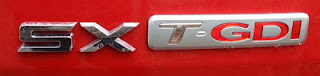 Kia Sportage SX T-GDI badge - Subcompact Culture