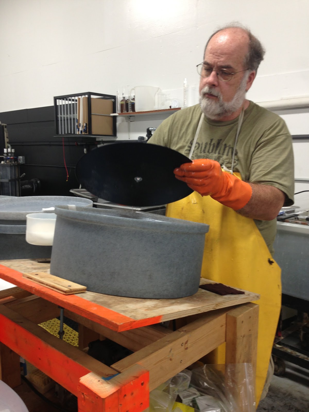 A shingle on Main Street Quality Record Pressings (Salina, Kansas)