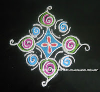 hand drawn rangoli with spirals and patterns rangoli-design-simple-8.jpg