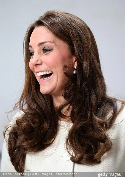  Catherine, Duchess of Cambridge smiles during an official visit to the set of Downton Abbey at Ealing Studios