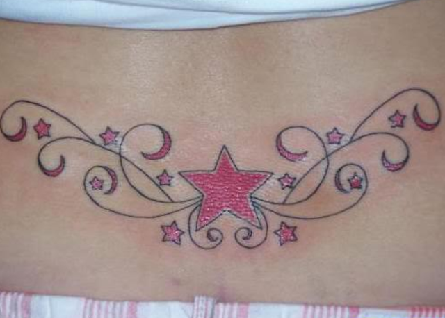 lower-back star tattoo