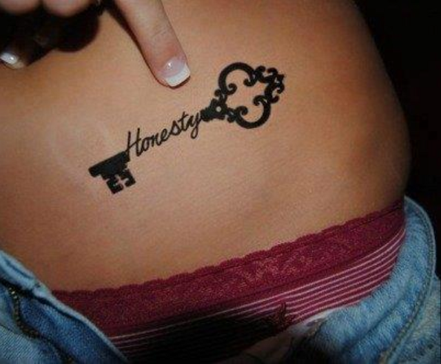 Honesty destiny key tattoo on  belly