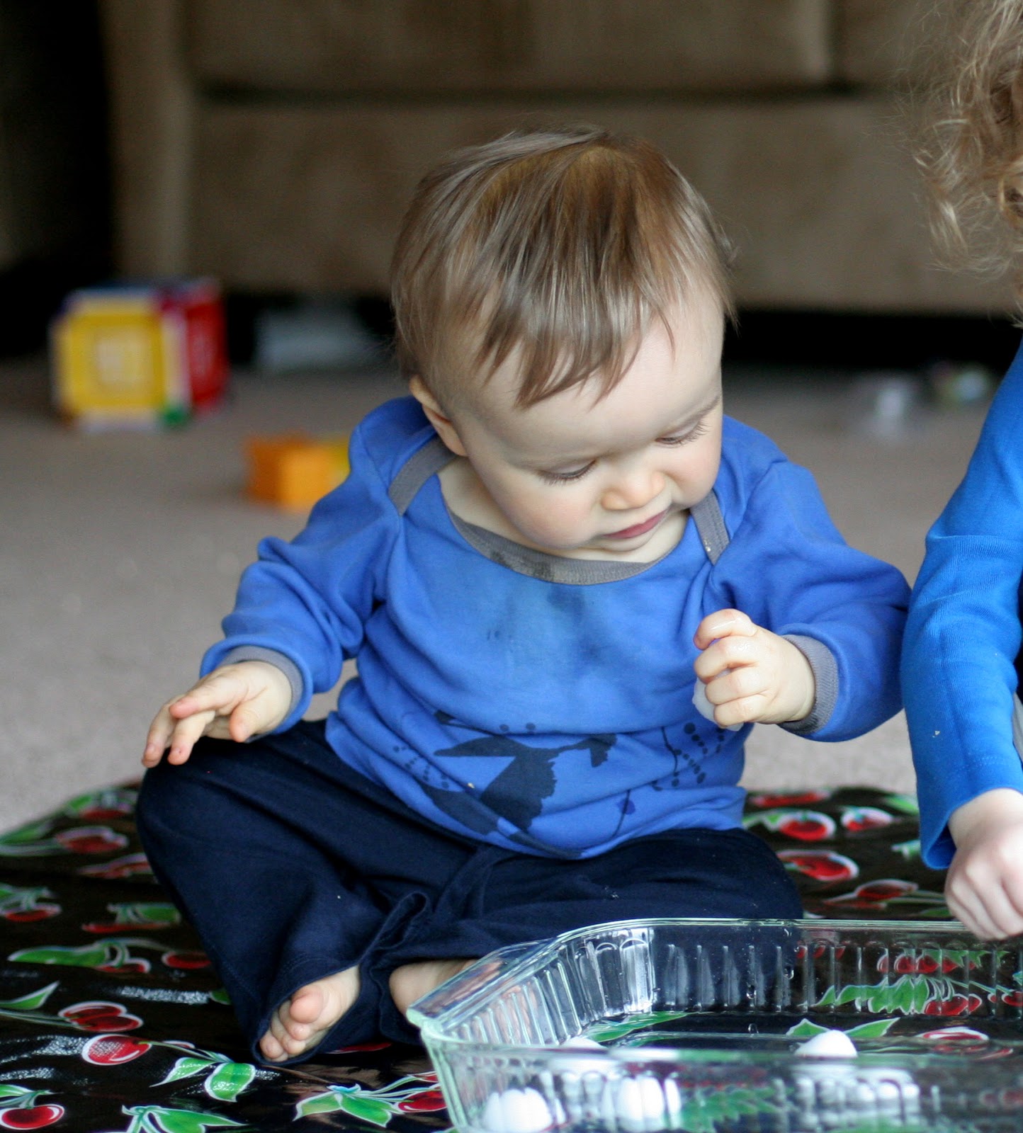 Super Easy Sensory Play Wet Cotton Balls