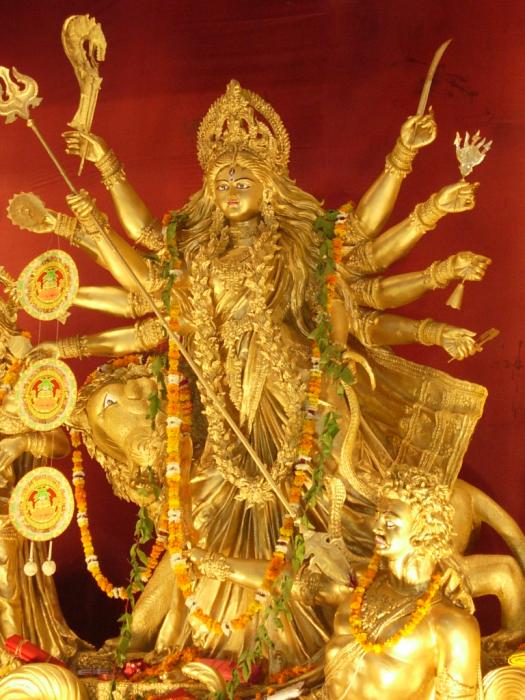 image of god durga.  Durga is also referred to as "Triyambake" meaning the three eyed Goddess 