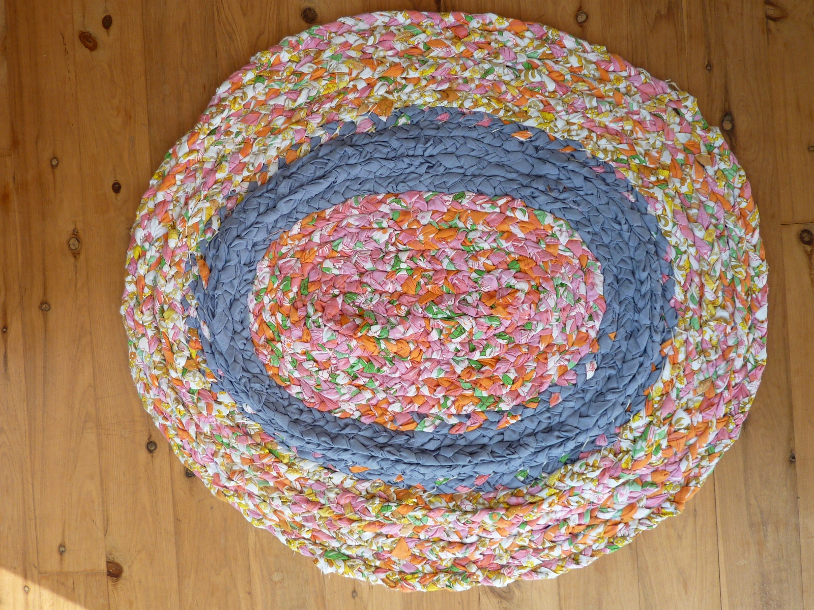 born again creations 41. A Braided Rug