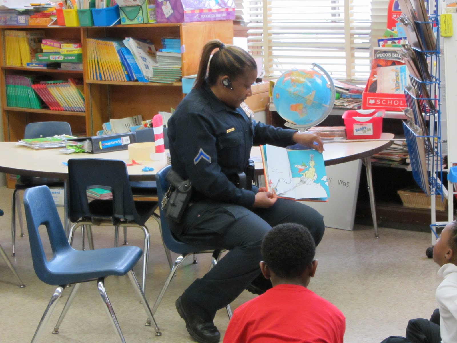 PGPD News District IV COPS Participate in Dr. Seuss' Read Across
