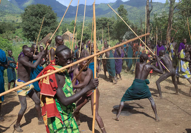 Zulu men demonstrating traditional fighting with sticks, Stock