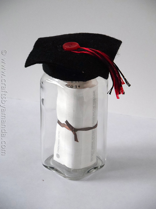 http://craftsbyamanda.com/2013/05/make-a-graduation-cap-gift-jar.html