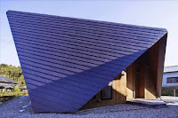 Origami House Design with A-Frame in an Old Village Surrounded by Mountains Origami House Design with A-Frame in an Old Village Surrounded by Mountains