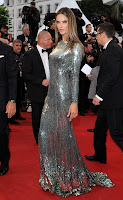 Alessandra Ambrosio wearing a silver dress at red carpet in Cannes 