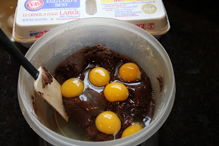 cake batter in a bowl with eggs