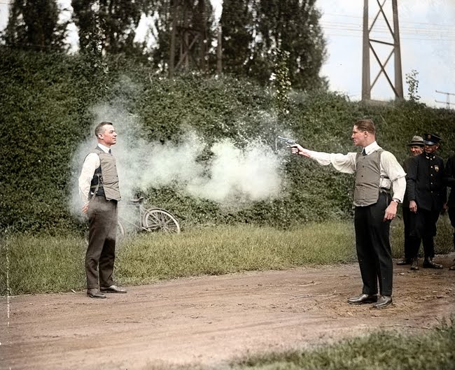 W.H. Murphy testing the bulletproof vest in 1923.