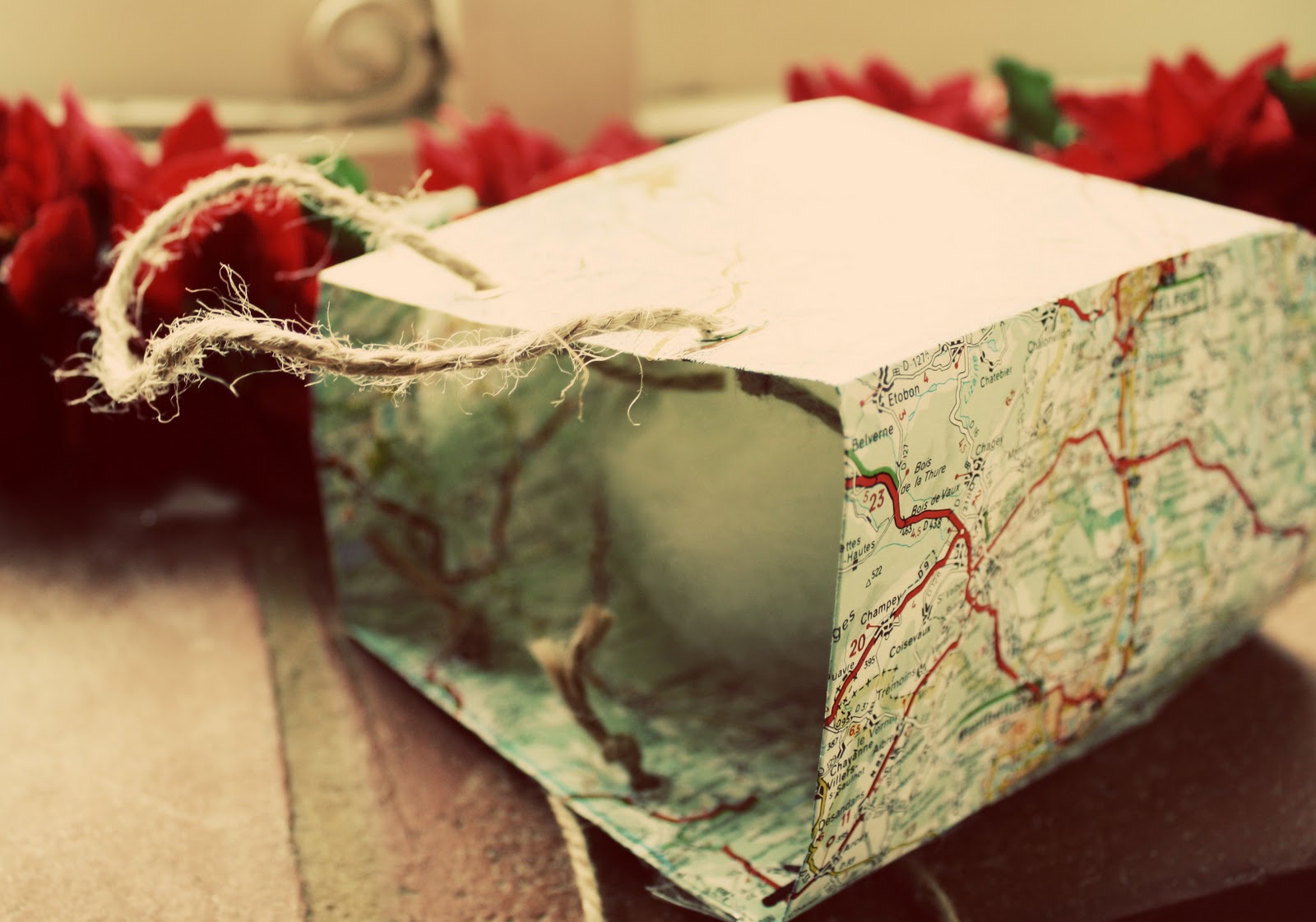 sewhungryhippie Make a gift bag from old maps or newspapers