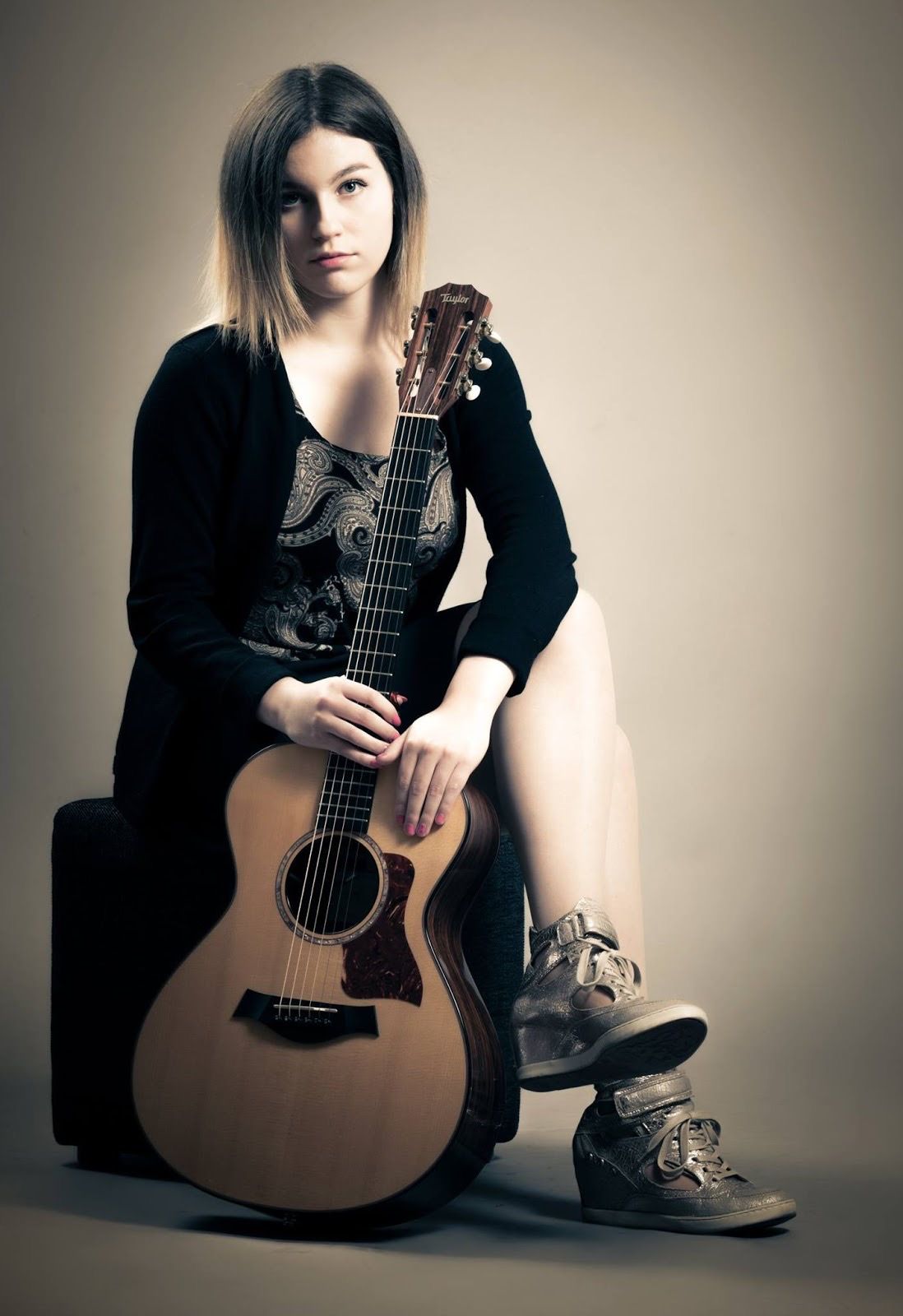 Gabriella Quevedo - She revives goldie oldies on her guitar.