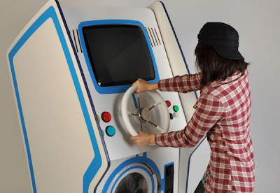 Mesin basuh yang boleh bermain permainan video