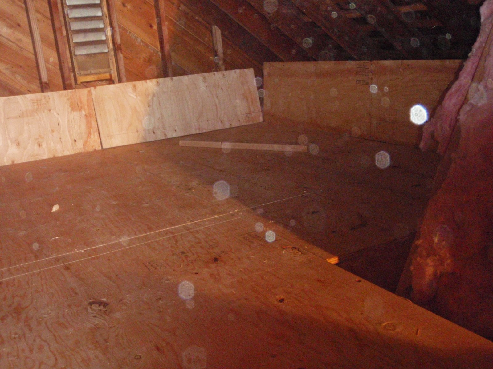 Home Pride Contracting Installing plywood in an attic