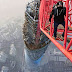 Two Russian men illegally climbed up the Shanghai tower in China. 