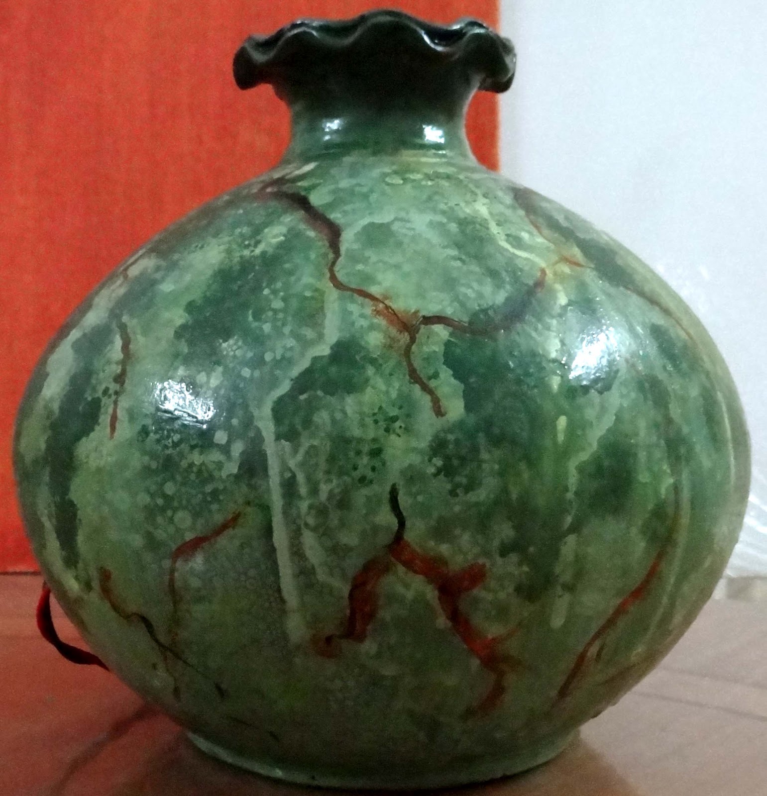 Art Musings 11. Decorating earthen pots artist Parmita