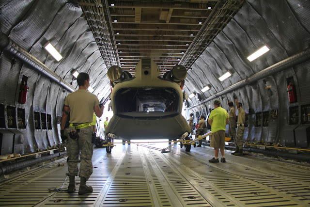 Boeing Service Engineering teams prepped and loaded the CH-47F into a C-5 Galaxy transport at Dover Air Force Base, Del., for delivery to Townsville, Queensland Australia. (Boeing photo) CH-47F in a C-5 Galaxy