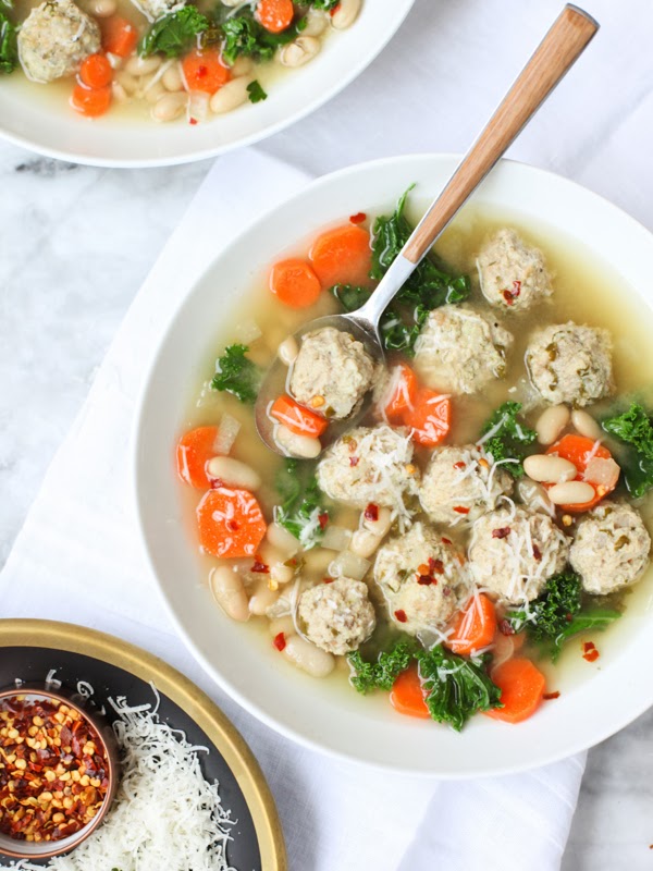 Skinny Slow Cooker Kale and Turkey Meatball Soup from FoodieCrush